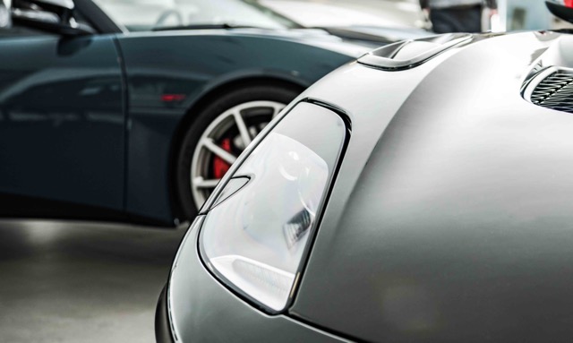 brand-new-luxury-cars-inside-a-dealership-showroom-Porsche 928